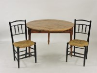 Lot 803 - A rustic pine circular top table