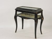 Lot 811 - An ebonised table display cabinet