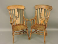 Lot 815 - A pair of Victorian lathe back elm armchairs