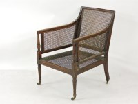 Lot 821 - A Regency period mahogany bergère chair