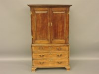 Lot 851 - A George III and later mahogany cabinet