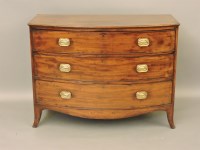 Lot 868 - A Georgian mahogany bow front chest of drawers