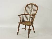 Lot 825 - A Victorian ash and elm Windsor armchair