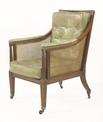 Lot 227 - The Claremont House Library Chair

A George III mahogany bergère chair