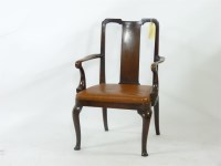 Lot 592 - A George II solid walnut elbow chair