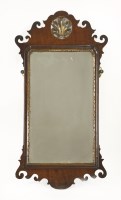 Lot 595 - A walnut wall mirror