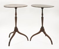 Lot 602 - A pair of George III-style mahogany tripod tables