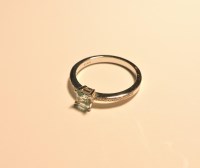 Lot 174 - An 18ct white gold single stone princess cut aquamarine ring
