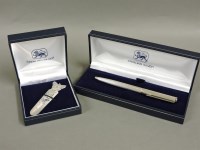 Lot 465 - A modern cased engine turned silver ball point pen