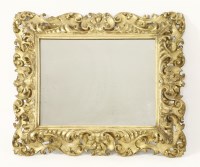 Lot 456 - A carved giltwood wall mirror