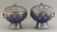 Lot 49 - A pair of blue and gilt Stem Bowls and Covers (Dou)