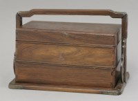 Lot 378 - A rosewood tiered box