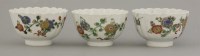 Lot 246 - Three chrysanthemum fluted Tea Bowls