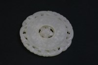 Lot 94 - A white jade Disc
