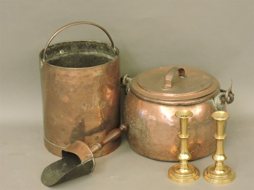 Lot 566 - A Georgian oval copper cooking pot with lid and iron handle