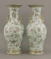 Lot 71 - A pair of famille rose celadon ground Vases