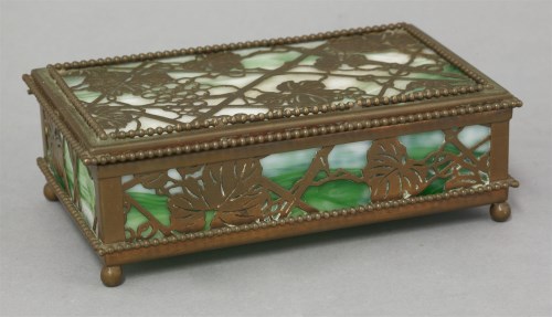 Lot 221 - A Tiffany gilt brass and glass 'Vine' pattern box