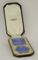 Lot 233 - An Art Deco silver and pale blue enamel compact and cigarette case