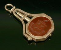 Lot 436 - A gold watch key/swivel