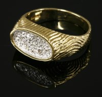 Lot 543 - A gentlemen's 18ct gold diamond set signet ring