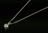 Lot 624 - An 18ct white gold single stone diamond pendant