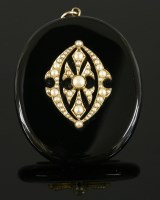 Lot 330 - A late Victorian split pearl and onyx locket back pendant