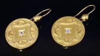 Lot 327 - A pair of Victorian gold and diamond shield form drop earrings