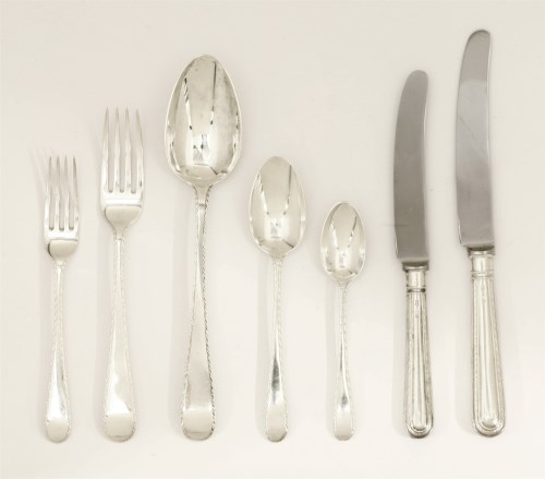 Lot 55 - A George III/IV silver old english feather edge pattern flatware service