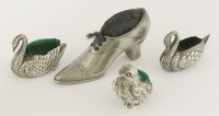 Lot 254 - Four Edwardian novelty silver pincushions