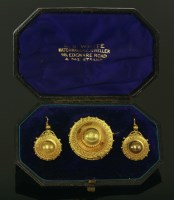 Lot 323 - A cased late Victorian gold brooch and earring shield form suite