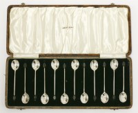 Lot 66 - A set of twelve silver bean end coffee spoons