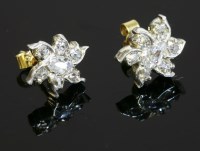 Lot 348 - A pair of diamond cluster earrings