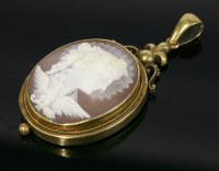 Lot 336 - A Victorian gold carved shell cameo pendant