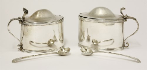 Lot 59 - A pair of George III silver mustard pots