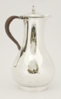 Lot 60 - A George III silver hot water jug