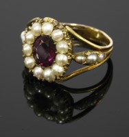 Lot 318 - A Georgian gold foiled amethyst and split pearl ring