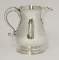 Lot 127 - A George II silver beer jug