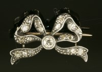 Lot 347 - A late Victorian diamond set bow brooch