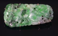 Lot 451 - A carved jade plaque brooch