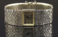 Lot 590 - A ladies' 9ct white gold Beuche-Girod mechanical bracelet watch