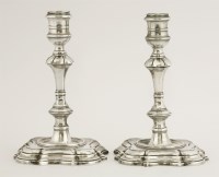 Lot 173 - A pair of silver candlesticks