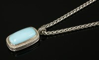 Lot 554 - A sterling silver turquoise and diamond Albion pendant