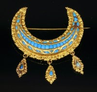 Lot 392 - An Indian antique gold and turquoise set crescent brooch