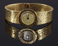 Lot 479 - A ladies' 9ct gold Bueche-Girod mechanical bracelet watch