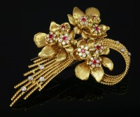 Lot 487 - An 18ct gold ruby and diamond spray brooch