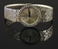 Lot 510 - A ladies' 18ct white gold Bueche-Girod mechanical bracelet watch