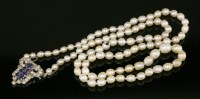 Lot 438 - A single row graduated natural pearl necklace