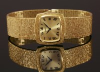 Lot 480 - A ladies' 18ct gold Piaget mechanical bracelet watch