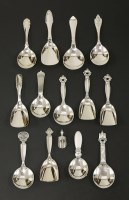 Lot 260 - A collection of fourteen Georg Jensen silver caddy spoons