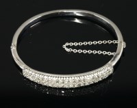 Lot 343 - A late Victorian two row diamond set bangle